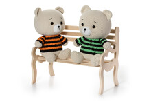 Handmade Toys Beige Bears Sit On The Bench. Full Depth Of Field. With Clipping Path.