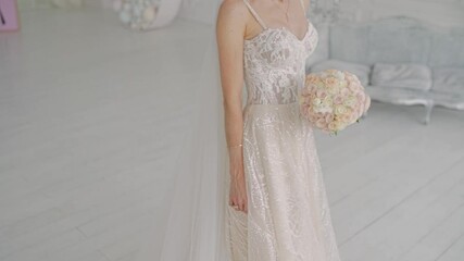 Poster - bride with wedding bouquet in dress in studio