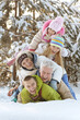 © aletia2011 - Big happy family having fun in winter park covered with snow