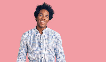 Wall Mural - Handsome african american man with afro hair wearing casual clothes looking positive and happy standing and smiling with a confident smile showing teeth