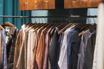 Wall Mural - men clothing on hanger in a shop - shopping in mall concept