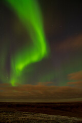 aurora borealis above the clouds