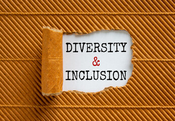 Diversity and inclusion symbol. Words 'Diversity and inclusion' appearing behind torn brown paper. Beautiful background. Business and diversity and inclusion concept.