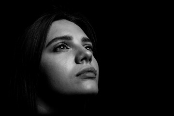 Wall Mural - Black and white portrait of a young woman