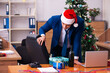 © Elnur - Employee in the office during christmas party