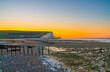 Cuckmere Haven beach at sunrise overlooking Seven Sisters cliffs. England 