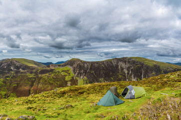 camping tents at the top of haystacks in lake district. england