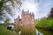 An ancient Dutch castle reflected in the pond