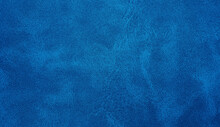Blue Leather Texture Closeup With Detailed Background. Blue Abstract Uneven Grunge Background Texture Of Interior Classic Chamois Leather Fabric. 