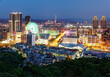 Aerial panorama of busy Taipei City, the capital of Taiwan, with view of a giant Ferris wheel in Dazhi Commercial District & Taipei 101 Tower in downtown area at dusk ~ A romantic night in Taipei