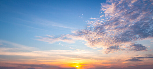 Wall Mural - world environment day concept: sky and clouds autumn sunset background