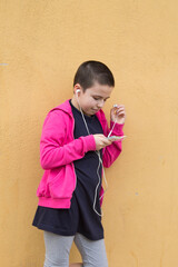 Wall Mural - girl listening to music with smartphone headphones