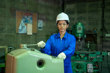 Aufkleber - Engineering worker women in blue uniform working at factory,Engineering and industrial concept.