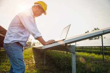 Wall Mural - The engineer is checking the solar cell power system. - Image