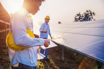 Wall Mural - The engineer is checking the solar cell power system. - Image