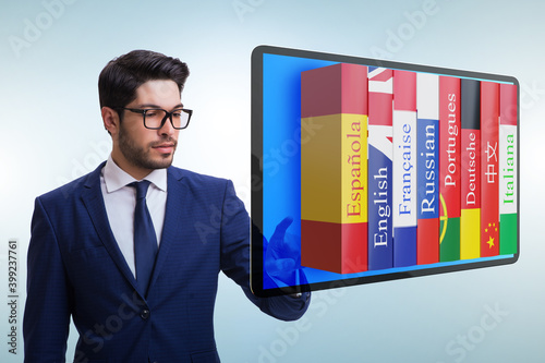 Online language learning with businessman Fotobehang