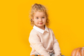 Wall Mural - Cute little girl on color background