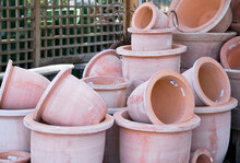 Stacked Terracotta Pots In Garden Centre.