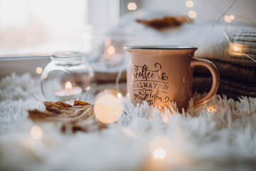 coffee mug and book on white