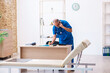 © Elnur - Old male doctor working in the clinic
