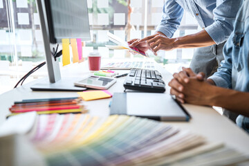 Aufkleber - Two colleague creative graphic designer working on color selection and color swatches, drawing on graphics tablet at workplace with work tools and accessories