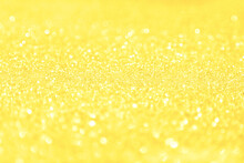 Festive Yellow Glitter Background Illuminating Color 2021.