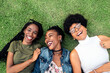 © Santi Nunez/Stocksy - Three afro women lying down