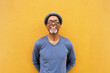 © Santi Nunez/Stocksy - Senior black man standing.