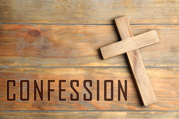 Canvas Print - Christian cross and word Confession on wooden background, top view