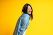 © Santi Nunez/Stocksy - Portrait of Young Asian Woman Laughing