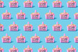© gemma ferrando & jeremie roman/Westend61 - Pattern of pink shopping baskets filled with clothing