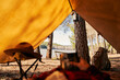 © Santi Miquel/Westend61 - Bushcrafter relaxing while lying down in forest while holding metal cup