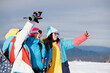 Women makes selfie in winter mountains landscape.
