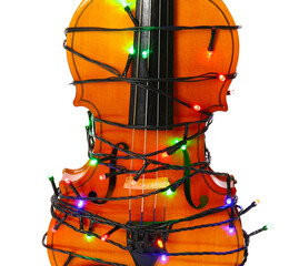 Violin with Christmas lights on white background