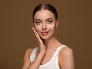 Wall Mural - cream on face woman beauty cosmetic concept healthy hydration skin