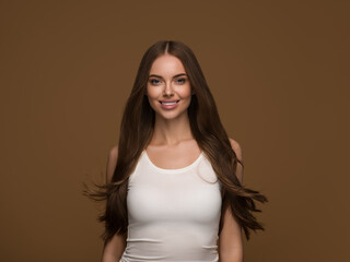 Wall Mural - healthy teeth smile beauty long hair woman clean skin happy female portrait