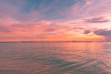 Canvas Print - Sunrise over ocean. Majestic colorful sky, peaceful seascape, calm waves surf concept. Sunset sea, endless horizon, orange yellow colors. Tranquil sea surface
