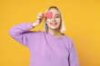 © ViDi Studio - Smiling fun young blonde caucasian woman 20s bob haircut bright makeup wearing basic purple shirt holding covering one eye with big red heart mock up isolated on yellow background studio portrait