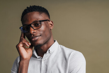 Sticker - Confident young african man wearing smart white shirt