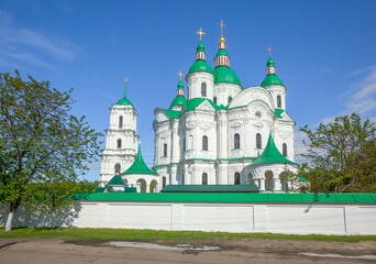 Wall Mural - Beautiful white green-domed orthodox church in Ukrainian town of Kozelets