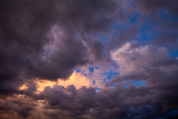 Wall Mural - sunset with pink clouds and blue sky