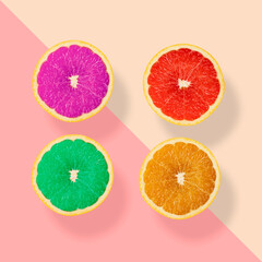 Wall Mural - creative fantastic four orange fruit, purple red green and orange fruits on pastel background