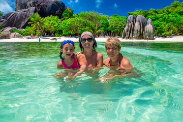 Poster - Happy family in the water, tropical destination. Holiday and travel concept