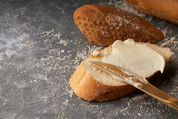 Wall Mural - bread and butter, nutritious breakfast sandwich French baguette