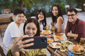 Wall Mural - Asian people party and take a selfie