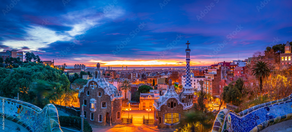 Obraz na płótnie Sunrise in Barcelona seen from Park Guell. Park was built from 1900 to 1914 and was officially opened as a public park in 1926. In 1984, UNESCO declared the park a World Heritage Site w salonie