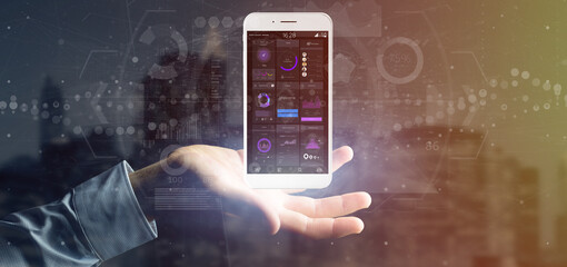 Poster - Businessman holding Smartphone with user interface data on the screen isolated on a background
