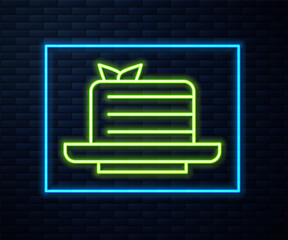 Sticker - Glowing neon line Medovik icon isolated on brick wall background. Honey layered cake or russian cake Medovik on plate. Vector.