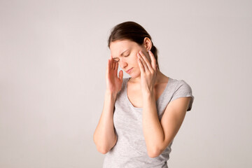 Canvas Print - Young beautiful woman has headache