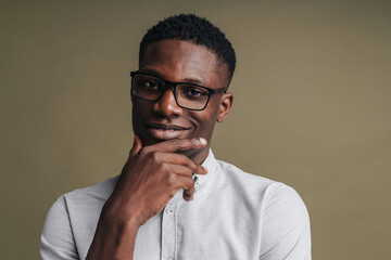 Sticker - Confident young african man wearing smart white shirt